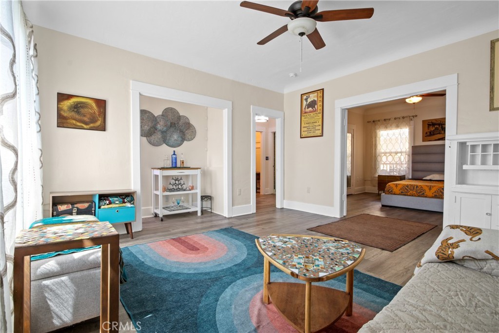 Charming Downtown Condo Just One Block from Pine Ave! Enjoy the best of downtown living in this beautifully maintained and updated 1-bedroom condo, ideally located just one block from vibrant Pine Avenue. Situated on the third floor, this bright and breezy unit boasts west-facing views, abundant natural light, and refreshing ocean breezes—all while offering peace and privacy with no shared walls in the living room or bedroom. The spacious bedroom features 1920s French doors, walk in closet, and a ceiling fan for added comfort. The generously sized kitchen includes a stainless steel refrigerator and stove, white cabinetry, and a cozy dining area. High ceilings, fresh paint, updated dual pane windows in the living room, and updated flooring throughout add modern comfort to the home’s vintage charm. You'll appreciate the ample storage, with three closets (one large enough for a home office), plus a large assigned basement storage room, and a shared bike locker. The pet-friendly building includes community laundry, and monthly permit parking is available nearby. For buyers looking for an urban loft feel, some of the walls can be opened to reveal exposed brick walls (like the unit above it that recently sold for $400k!). Seller is willing to credit Buyer up to 3% towards Buyer Concessions. Seller is open to selling it fully furnished too! Great opportunity for an investor too - Condo was previously rented for $2100 before as a fully furnished monthly rental.