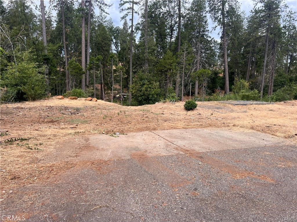 Discover your dream property nestled in the serene town of Paradise. This lot is perfectly situated on a quiet cul-de-sac, and offers the ideal blend of seclusion and convenience. Lot is 0.55 acres, connected to the city water and equipped with a septic system. Peaceful cul-de-sac, providing a secluded atmosphere perfect for privacy and tranquility. This lot offers ample space to build your custom home, with the natural beauty and calm of a secluded setting.