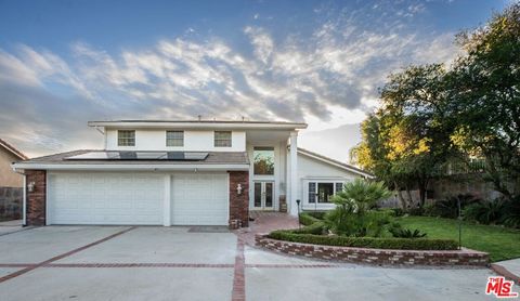 Photo of 11753 Castillo Lane, Porter Ranch, CA 91326 (MLS # 25621799)