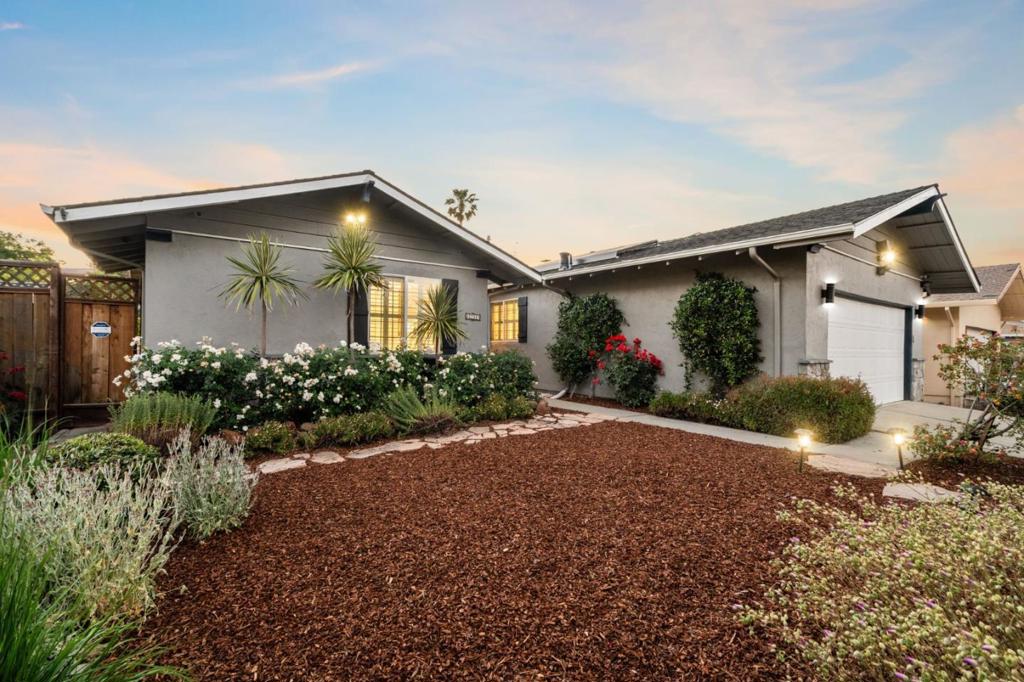 Welcome to 5749 San Lorenzo Drive, an inviting single-story home nestled in the desirable Blossom Valley area of San Jose within walking distance to grocery stores, restaurants & VTA station. This 4 bedroom, 2 bathroom retreat offers 1,593sq ft of cozy living space on a beautifully landscaped 6,800 sq ft lot. Enjoy modern comforts including a new Carrier Energy- Efficient Heat pump HVAC system, Smart Thermostat, 7.1 Built-in Speaker Systems in living area, newly painted interior, new carpets, and recessed lighting. The kitchen boasts a professional Bertazzoni 5 burner range, Ancona Range Hood, Samsung Smart refrigerator, and Bosch dishwasher. Relax with friends and family out on the Trex deck and patio, listen to your favorite music through the Yamaha outdoor speakers, find zen in the eye-catching waterfall feature, or stroll through the gardens teeming with fruit trees and flowering plants. The home comes with a low maintenance whole house water purifier, security cameras, smart sprinkler systems, plantation shutters, and finished garage with overhead storage. Minutes away are Cahalan and Foothill Parks, Westfield Oakridge Mall, Boulder Ridge Golf Club as well as commuter routes 85, 87, and 101. Don't miss out!