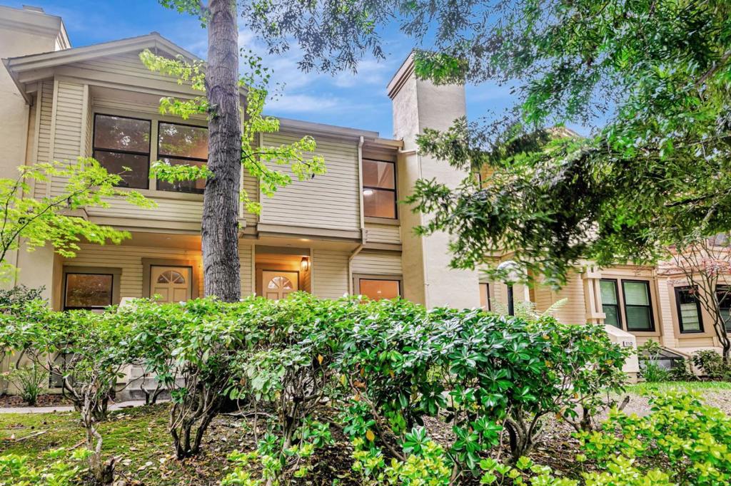 Welcome to this charming 4-bed, 2.5-bath home nestled in the serene redwood grove complex. Boasting 2,082 sf living space, this residence combines comfort and an unbeatable location. The kitchen is a chefs dream: a modern island, sleek quartz countertops, and SS appliances. Brand new luxurious Engineering Hardwood flooring on the main level add a touch of timeless elegance. Upstairs, brand new plush carpeting in the sleeping quarters offers warmth and comfort, providing a peaceful retreat for relaxation.The primary suite comes with a retreat area, offering a private and tranquil space after a long day's work. The primary ensuite bath has been extensively updated: extra large shower and dual-sink vanity. Remodeled hall bath and powder room adorned with recess lights and LED mirrors. A spacious bonus room on lower level offers flexibility as a home office or home theater. Central AC and central heating ensure year-round comfort. Laundry is conveniently located in the utility room. Attached 2-car side by side garage. EZ commute to major high-tech companies. Homestead High School. Don't miss the opportunity to make this beautiful home your own!