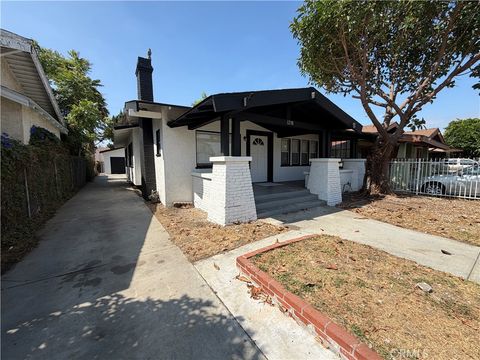 Photo of 1238 W 55th ST, Los Angeles, CA 90037 (MLS # IV26146867)
