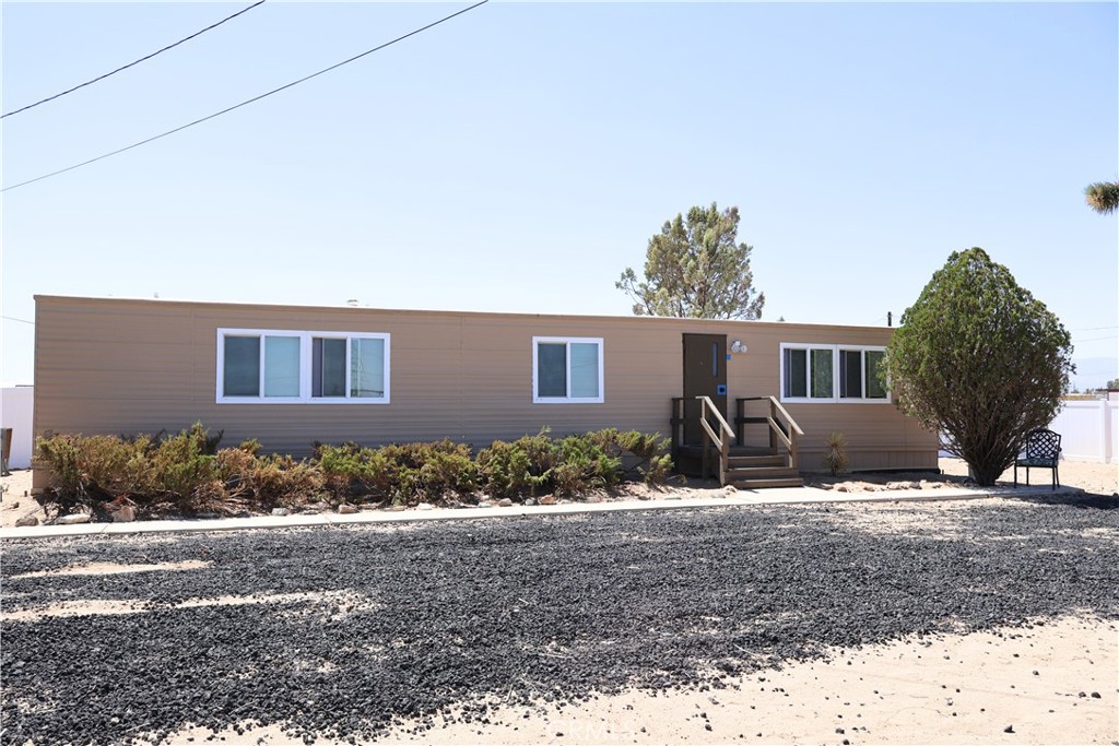 Welcome to this beautiful remodeled home! Comes with new interior paint. 3 spacious bedrooms with new carpet. All have their own closet. 2 bathrooms with new mirrors, vanities and toilets. New vinyl flooring throughout the home. The stove, kitchen sink and kitchen cabinets are new. Comes with a pantry. Spacious dining area that opens up to the living area. New light fixtures. Laundry hookups gas and electric are inside the home. Central heating and air conditioning. New windows also throughout the home. All on a permanent foundation! New paint on the exterior of the home. Covered patio out back. Huge backyard with a well. The yard has so many possibilities. Enough space for your pets, atv's, or sheds. Real quiet and peaceful location. A detached garage with parking for one vehicle. The other half of the garage can be used as a workshop or storage place. Local family park is 5 minutes away. Schools are right down the street. Amenities are about a 10 minute drive. Highway 395 is a stone throw away. Make your appointment to view this amazing home today!