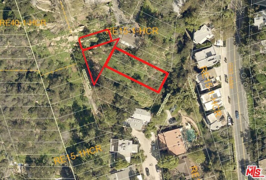 Investment opportunity! TWO adjacent buildable lots, 2311 Beverly Glen Place (APN 4380-003-002) and 2312 Bushrod Lane (APN 4380-003-023) are being offered as a package. Build two houses or tie lots and create a larger home in this beautiful nook off busy Beverly Glen Blvd, with a light! Using total sq footage, zoning would allow a 1,900 sq ft home...add one 30% bonus and an over 2,400 sq ft home is possible (buyer to verify). Both lots come with current soils reports and surveys. Beverly Glen Place lot has architectural plans that have been structurally engineered. These can easily be modified and enlarged. All available upon request. Old house plans, reports and surveys for Bushrod lot also pass with sale. Bushrod Lane lot has amazing rock formations and small caves on the Northern section. Please check with LADBS for specific questions and details. Text or email for more information.
