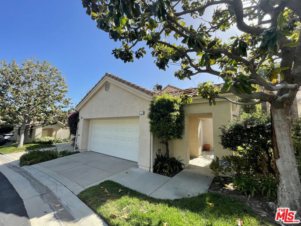 Enjoy living in a spacious townhouse that feels like a single-family home with over 2,675 sq. ft. of living space in the sought after gated Palisades Sea Ridge community. The flexible floorplan offering the ability to have a four-bedroom residence or a three-bedroom and a den/office is the most desirable floorplan in the community. The main level features a bright and airy living room with a fireplace, large kitchen with a breakfast area, powder room, balcony and a master suite with a walk-in closet. The lower-level features two bedrooms (one with large walk-in closet), two bathrooms, a wonderful family room with a fireplace and a large bonus room that can be used as a bedroom or den. Other features include a laundry area with storage cabinets, two-car private garage with a huge attic storage area above the garage and sizable balconies on both levels with mountain views. The Sea Ridge community features a pool, spa, guest parking and is situated near the beach and provides easy access to the Village.
