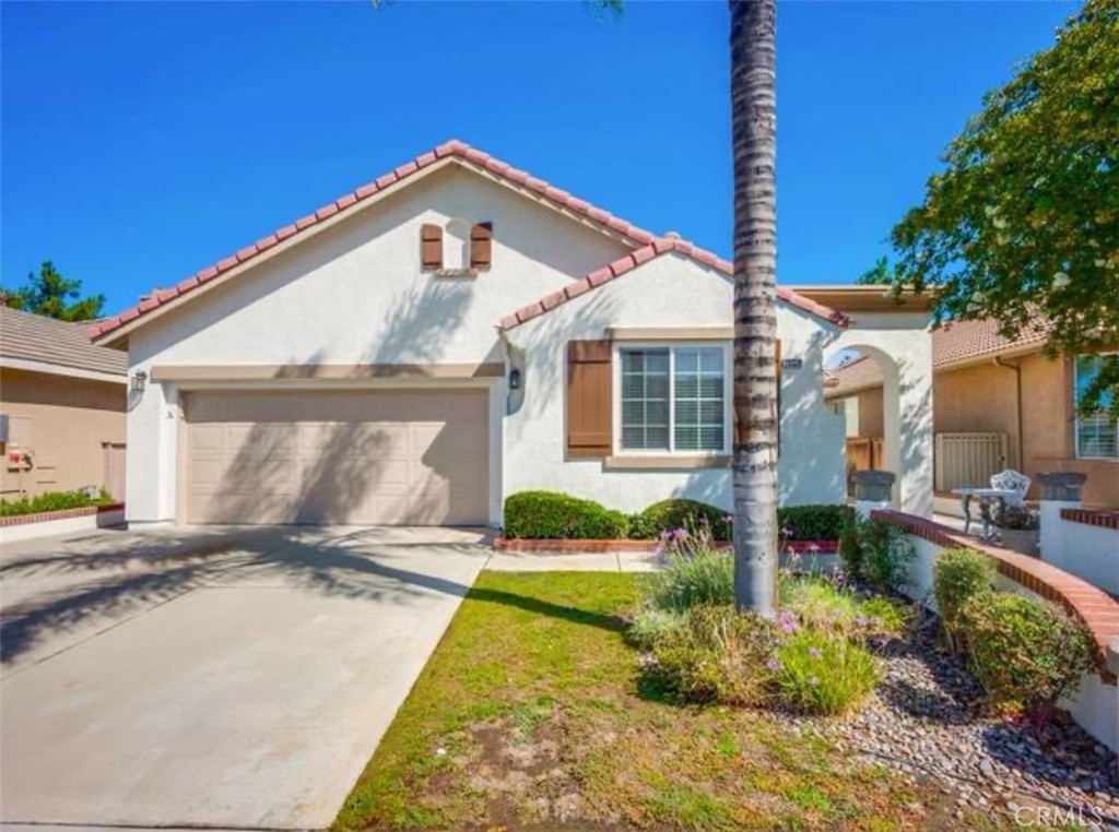 Wake up to sunshine, strolls by the fairway, and a community designed for relaxation and connection. This beautifully refreshed single-story home offers 3 bedrooms and 2.5 bathrooms in a light-filled, open layout. Step inside to discover brand-new luxury vinyl wood tile flooring, fresh interior and exterior paint, and a thoughtfully upgraded guest bathroom sink. The spacious kitchen with abundant cabinetry and a large breakfast bar opens seamlessly to the living and dining areas, creating the perfect setting for both relaxation and entertaining. The primary suite is a private retreat, featuring a spa-like bathroom with dual sinks, a soaking tub, and a walk-in shower. Located NEXT TO THE RANCHO DEL SOL GOLF CLUB, this GATED COMMUNITY offers RESORT-STYLE AMENITIES, including a CLUBHOUSE FOR EVENTS, BBQ GRILLS, A SPARKLING POOL, AND PICKLEBALL COURTS. Outside, enjoy a low-maintenance backyard designed for peaceful mornings or evening gatherings. Experience privacy, comfort, and the vibrant lifestyle this 55+ community is known for.