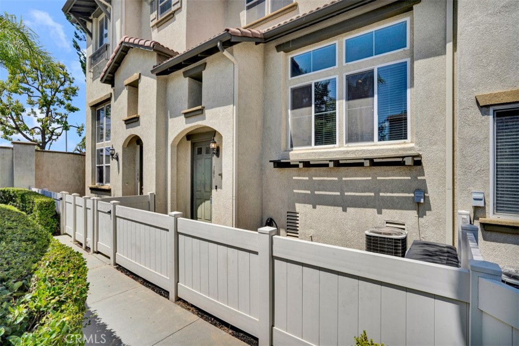 Welcome to this beautifully maintained multi-level home offering 3 bedrooms and 2.5 bathrooms in a secure, gated community. Ideally located near Kaiser and Loma Linda Hospitals with easy freeway access, this home is perfect for commuters. Step inside to soaring high ceilings and an open layout, complemented by an updated kitchen featuring stainless steel appliances. The spacious master suite includes a walk-in closet, dual sinks, a separate tub, and shower for a spa-like retreat. Enjoy added convenience with upstairs laundry, a 2-car attached garage, and a small front patio perfect for relaxing. Just steps away from the community pool, this home combines comfort, style, and convenience in a prime location.