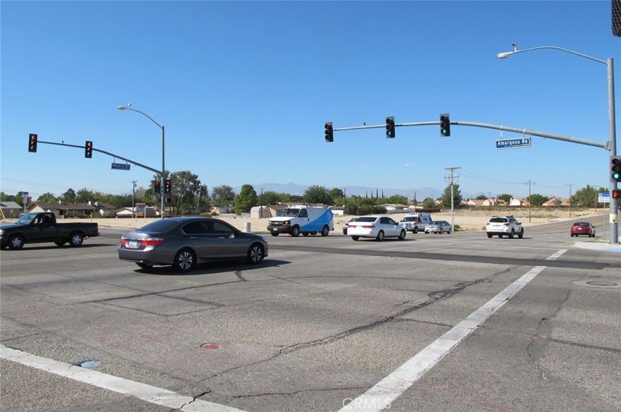 Prime signalized corner on Mojave Drive and Armargosa Road in Victorville just 3/4 miles from Interstate 15.  Busy intersection with a traffic count of over 17,000 car trips per day.  Approximately 3,000 households within a 1-mile radius.  Utilities are near site.  Zoning is Residential City Initiative Area. This zoning allows all C-1 (Neighborhood Service Commercial) with Conditional Use Permit (CUP) call for details.