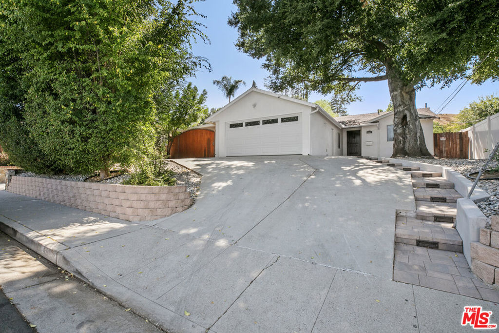 Discover this stunning 4-bedroom, 3-bathroom single-story home for lease at 4949 San Feliciano Dr, Woodland Hills, CA 91364ideally situated South of the Boulevard in one of the area's most sought-after neighborhoods. This beautifully updated residence offers 1,800 sq ft of open-concept living space with modern finishes throughout, including a spacious living room with a stylish fireplace, recessed LED lighting, and a remodeled kitchen featuring brand-new stainless steel appliances and custom cabinetry. The oversized primary suite provides a peaceful retreat with a fully upgraded en-suite bathroom, while three additional bedrooms offer ample space for family, guests, or a home office.Step outside into your private entertainer's backyard complete with a jacuzzi, expansive patio, and lush landscapingperfect for outdoor dining, relaxation, or gatherings. Additional upgrades include a fully paid solar panel system for reduced energy costs, fresh interior, central HVAC, newer electrical panel, and plenty of parking. Located near top-rated Woodland Hills schools, scenic hiking trails, Whole Foods, Ventura Blvd dining, and the Calabasas Commons, this home combines luxury, efficiency, and unbeatable convenience. A rare lease opportunity in prime Woodland Hillsdon't miss your chance to call this South of the Blvd gem your next home!