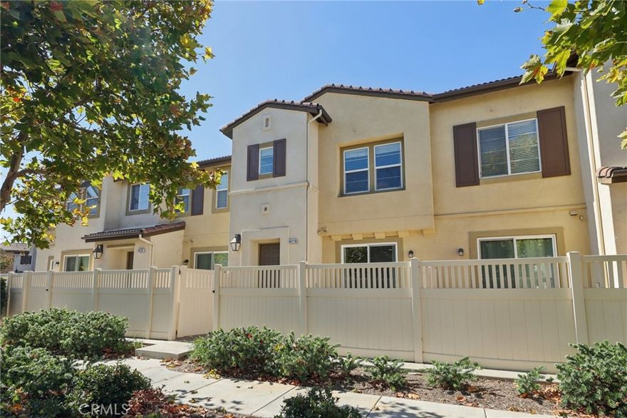 Welcome to this stunning home that feels brand new, offering stylish upgrades and a thoughtfully designed layout. A private gated front patio greets you, leading inside to an inviting open-concept living, dining, and kitchen area. The kitchen shines with granite countertops, penny tile backsplash, fresh white cabinetry, stainless steel appliances, and bar seating, making it a perfect spot for entertaining. The main floor also includes a convenient powder room and direct access to the 2-car garage with a new epoxy floor and overhead metal storage shelf. Upstairs, you’ll find three well-sized bedrooms and two full bathrooms, all with ceiling fans, including a primary suite with a walk-in closet and en suite bath featuring a dual sink vanity and large soaking tub. The laundry closet is also conveniently located on the second level. Enjoy resort-style amenities in the Allegra and Aldea at Paseo Del Sol community, offering a sparkling pool, spa, and beautifully maintained grounds. With a prime location near shopping centers, dining options, schools, and the hospital, this home combines modern comfort and convenience in one perfect package.