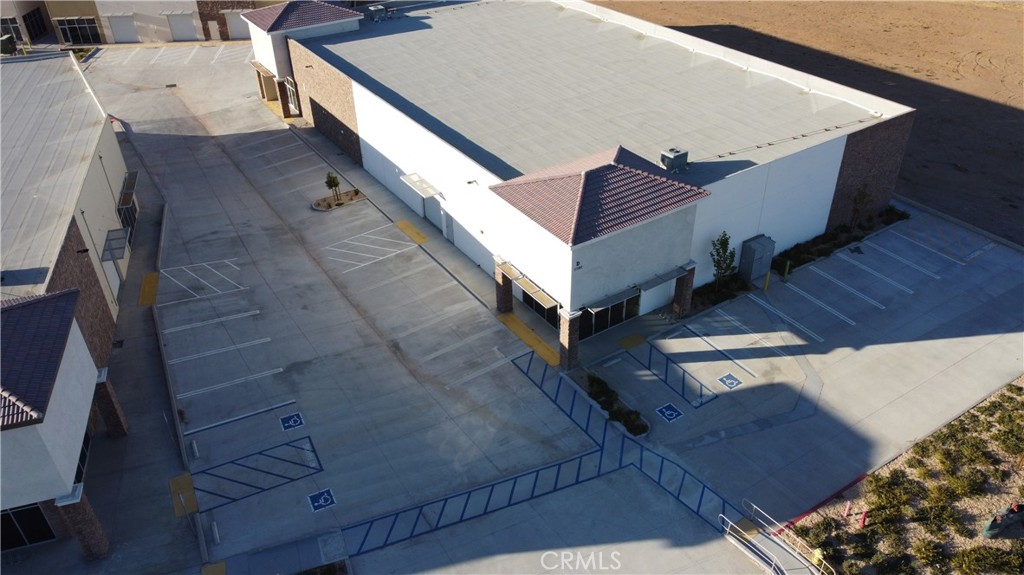 Building D is ±15,827 Sq. Ft. and includes three (3) ground level roll up doors and two (2) built out offices at each end of the building. Potential to divide the building in half.