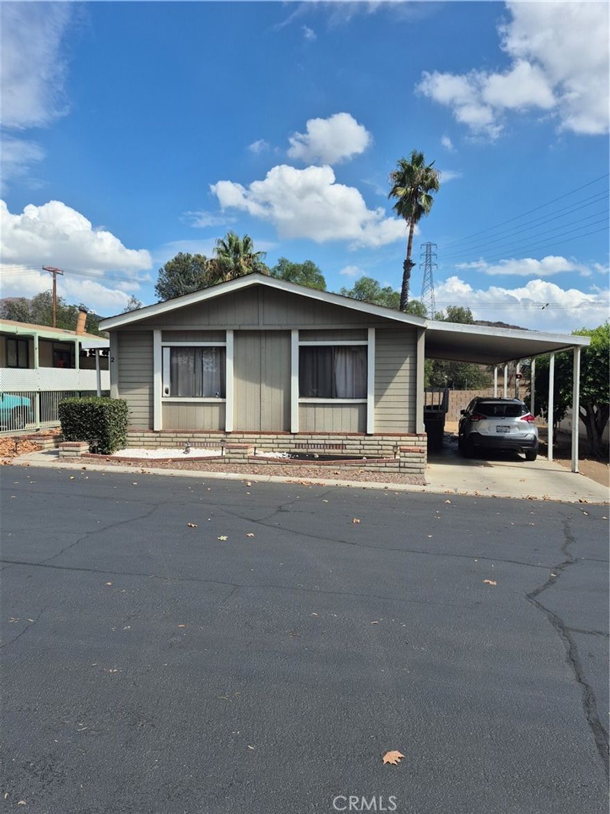 This is a DIY opportunity!! This spacious 2 bedroom 2 bath home boasts over 1400 sq. ft of living space. The current owner split the 2nd bedroom in half creating a 3rd bedroom in addition to adding a bonus room / home office. The main bedroom needs your creativity and personal touch. There is currently no flooring and the bathtub has been removed. The rest of the home has newer flooring and looks amazing. The home needs your personal touches and a little bit of work but is priced accordingly. Great home in a family park and is located right across the street from the clubhouse and amenities!