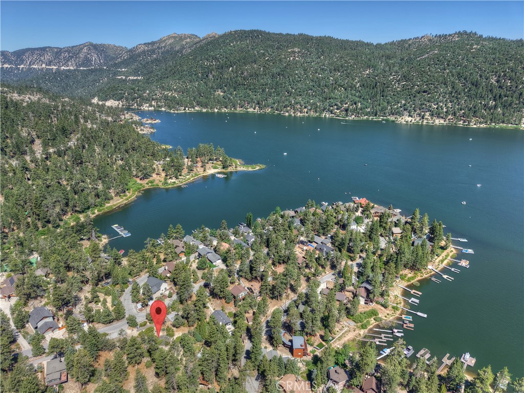 ATTENTION BUILDERS, DEVELOPERS, OR INVESTORS! A rare offering of two adjacent homesites at the entry to Pappose Bay. Each lot measures approximately 61' X 145' with a gentle downslope, making it easy to build on. Corner markers are present and a topo map is available for each lot. Buy one lot separately or both to create a .4 acre homesite. All utilities available to the property include city water, natural gas, electric, sewer and city-maintained roadway.