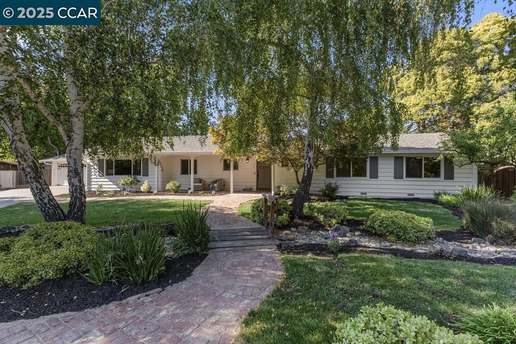 Discover 280 Fairway Drive, perfectly situated on a picturesque 0.53-acre lot adjacent to Diablo Country Club golf course. This single-level ranch home features four bedrooms and three full bathrooms within 2,463 square feet, providing an ideal setting for both relaxation and entertaining. Key features of the property include a great room with expansive windows, an additional family room, a modernized kitchen, and a tranquil yard. The beautifully landscaped grounds boast a pool and a generously sized lawn area. A large shed offers versatile potential as a playhouse or for storage. The flat lot is perfect for those considering adding an ADU. Conveniently located, this home offers proximity to twelve years of excellent Danville schools, easy freeway access, and is just a short golf cart ride away from Diablo Country Club. Seize the chance to own this exceptional home.