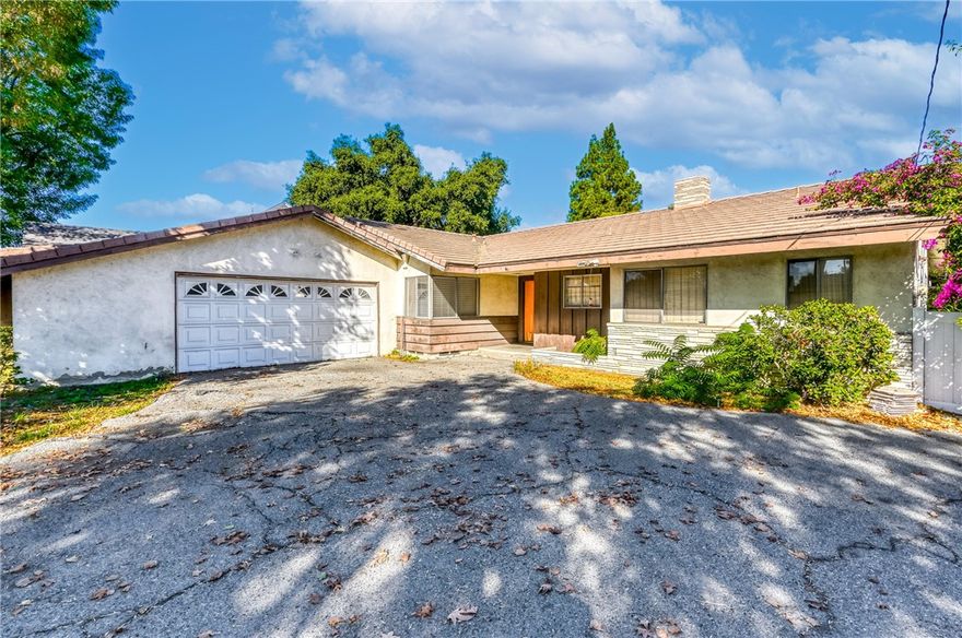 Nestled in the heart of the highly sought-after Arcadia neighborhood and within the top rated Arcadia School District, this 3 Bedroom, 2.5 bathroom ranch style home offers endless possibilities. Set on a sprawling 18,003 sq.ft. flat lot, the property presents a rare opportunity to create something truly extraordinary.  Whether you're envisioning a sleek modern estate, a timeless retreat, or a multi-generational haven, the potential is limitless.   

This home's spacious lot provides ample room for expansion, including the possibility of building a new custom home or adding and Accessory Dwelling Unit. With it's prime location, you'll enjoy both peace and privacy, while being conveniently close to schools, shopping, dining and major transportation routes. 

This property is being sold in its current AS-IS condition, allowing you to bring your own vision and personal touch to make it your own. Don't miss the chance to transform this property into the home of your dreams in one of Arcadia's most desirable neighborhoods.