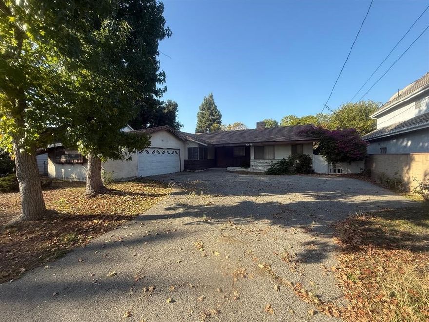 Nestled in the heart of the highly sought-after Arcadia neighborhood and within the top rated Arcadia School District, this 3 Bedroom, 2.5 bathroom ranch style home offers endless possibilities. Set on a sprawling 18,003 sq.ft. flat lot, the property presents a rare opportunity to create something truly extraordinary.  Whether you're envisioning a sleek modern estate, a timeless retreat, or a multi-generational haven, the potential is limitless.   
This home's spacious lot provides ample room for expansion, including the possibility of building a new custom home or adding and Accessory Dwelling Unit. With it's prime location, you'll enjoy both peace and privacy, while being conveniently close to schools, shopping, dining and major transportation routes. 
This property is being sold in its current AS-IS condition, allowing you to bring your own vision and personal touch to make it your own. Don't miss the chance to transform this property into the home of your dreams in one of Arcadia's most desirable neighborhoods.