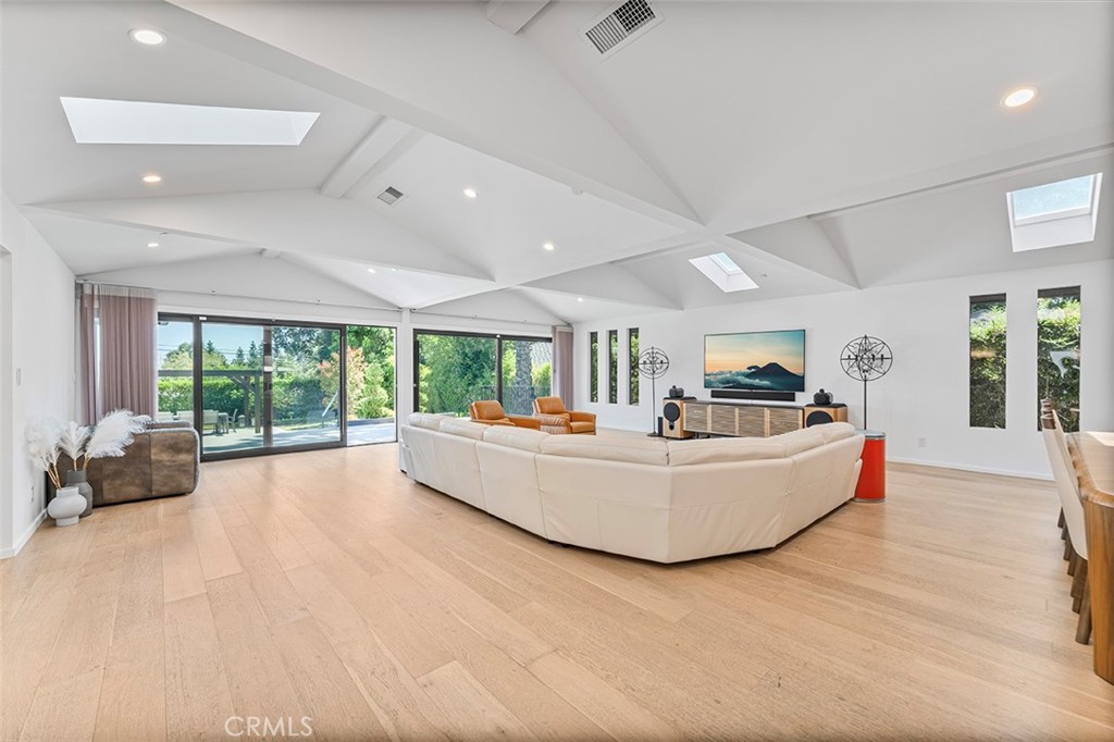 Welcome to 3850 Landfair Rd., Pasadena, CA 91107 — nestled in the highly desirable Lower Hastings Ranch community. This remarkable 4-bedroom, 3.5-bathroom home masterfully blends the classic character of Pasadena with the sophistication of modern design. Renovated in 2018, it showcases a tranquil, contemporary zen-inspired aesthetic with thoughtful craftsmanship throughout.
Step inside to an expansive open-concept layout that embraces effortless indoor-outdoor living. Floor-to-ceiling windows flood the interior with natural light, complemented by dramatic skylights set in custom diamond-patterned vaulted ceilings. The show-stopping chef’s kitchen features premium appliances, an oversized waterfall island, marble countertops, and elegant designer finishes.
The backyard is your own private retreat, combining beauty and low-maintenance functionality. Enjoy a sleek modern pool with Baja shelf, a chic poolside cabana, and a multi-tiered yard—including a third level ready for your personal touch. A rare underground wine cellar offers a luxurious space for entertaining or storing your prized collection.
The spacious primary suite overlooks the serene backyard, offering a calm and private escape. Additional highlights include engineered oak flooring, all-new plumbing and electrical, new pool equipment, built-in smart home features, and a fully integrated security system.
This home presents a rare opportunity to own like-new construction in a well-established, highly sought-after neighborhood.
Don’t miss your chance to experience the perfect balance of luxury, comfort, and location.