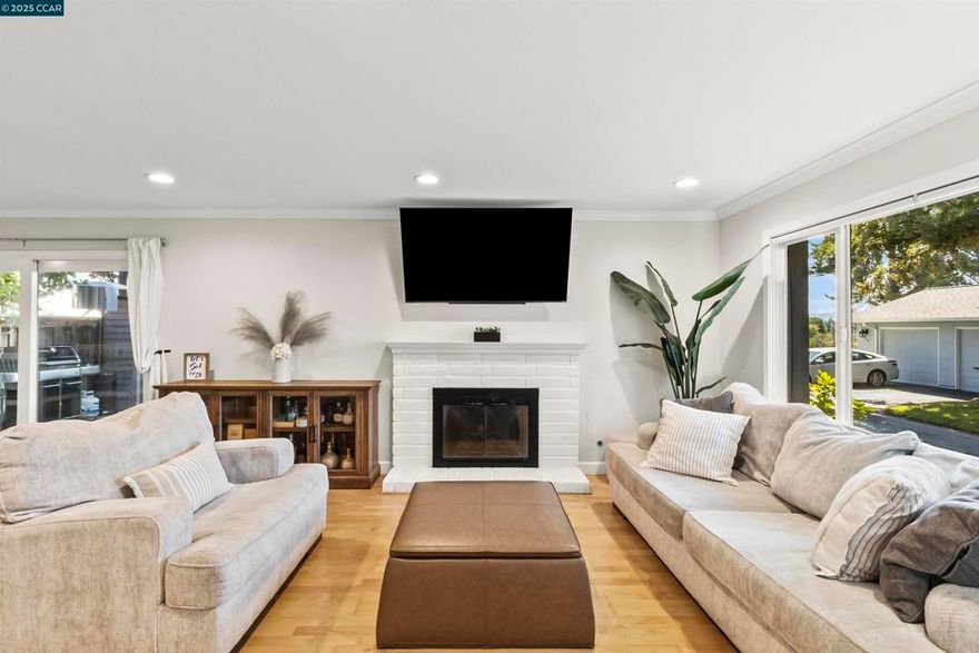 Open Saturday/Sunday Oct 11th & 12th 1-3pm!Set against sweeping views of Mt. Diablo, 104 Fountainhead Court blends modern upgrades with everyday comfort across 3 bedrooms, 2.5 baths, and 1,574 sqft. A major 2020 update brought a $20k high-efficiency HVAC with hospital-grade purification that even removes smoke—an upgrade rarely found at this price point. Inside, wide-plank white oak waterproof flooring, refinished hardwoods, and fresh interior paint create a clean, cohesive feel. The main level centers on a sleek gas fireplace, recessed lighting, and a refreshed kitchen with updated cabinets, stone-look counters, textured backsplash, stainless appliances, a deep basin sink, new faucet, and breakfast bar. Bathrooms feature recently replaced toilets, upgraded fans, and crisp finishes, while in-unit laundry and new carpet add convenience. The oversized primary suite offers two closets and abundant light, complemented by new closet doors in secondary bedrooms. Outside, a freshly painted exterior leads to a professionally designed backyard with turf, gazebo, and low-maintenance finishes. With a two-car garage, plenty of guest parking, and easy access to Highway 4 and 680, this one checks all the boxes—now all it needs is someone to call it home (yes, that’s your cue).