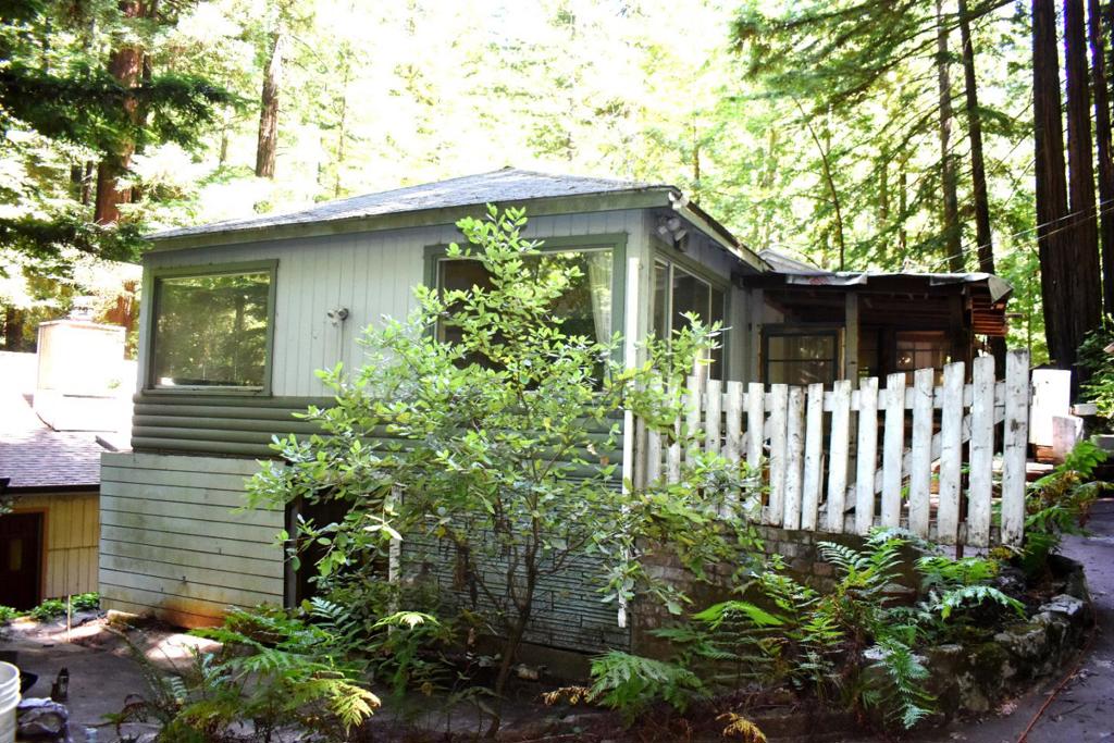 OPEN HOUSE SATURDAY 1-4. Older fixer . Great opportunity to make this place shine. Magical and serene setting Beautiful 8/10 acre property with pretty walking paths and creek views. 4 bedrooms and 1 bath and lots of room under home for storage or maybe a garage. Needs new septic. Permit is paid for