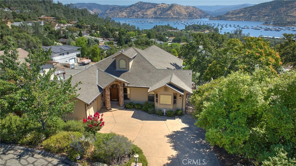 Absolutely stunning home in Kelly Ridge with lake views worth a MILLION DOLLARS!!! This gorgeous 3 bedroom (possible 4), 2.5 bath home is an entertainer’s delight! Want to live close to the lake and have enough room to store your boat and RV? This is the house for you! Want to wake up every morning sipping your coffee while having a view of the lake and mountains? This is the house for you! OR, is this the perfect home to slip away to only in the summer time and rent it out during the other parts of the year? Over 1,000,000 visitors come to Lake Oroville each year. This home has everything and more. With it’s low maintenance yard, you have more time to focus on the fun and not on the work. This home has been a vacation home/second home to the previous 2 owners and all components inside are in great shape! This move in ready home is available now and can be whatever you want it to be!
