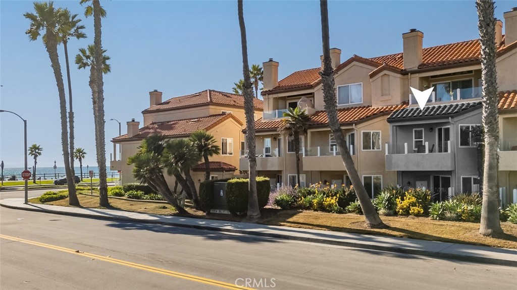 Enjoy White Water Views from this fantastic two story, 2 bedroom 2 and half bathroom, remodeled and furnished condo, with first level entry! Enjoy the ultimate Downtown Huntington Beach lifestyle with pool and hot tub amenities. Your kitchen opens to the family room and features stainless steel appliances and stone countertops. Luxury vinyl flooring runs through the entire property, creating a low maintenance beach lifestyle. The family room and casual dining area enjoy a gas fireplace and sliding glass doors that exit to an outdoor patio with storage and grill area. A half bathroom down is perfect for accommodating your guests. Your primary bedroom upstairs showcases a walk-in closet, private bathroom and has a second balcony/deck with incredible OCEAN AND WHITE WATER VIEWS! The secondary bedroom is generously sized with its own private bathroom, perfect for guests or a roommate. The laundry area is conveniently located on the second floor adjacent to your bedrooms. Never worry about beach parking with 2 secure, subterranean parking spots.