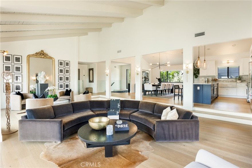 Luxury Furnished Rental with Stunning Views in Woodland Hills – South of the Boulevard!

Experience the perfect blend of elegance, privacy, and breathtaking views in this fully furnished high-end rental, nestled South of the Boulevard in Woodland Hills. Featuring an impressive floor plan with soaring beamed ceilings and an abundance of natural light, this exquisite home is designed to maximize comfort and serenity.

Step inside through the stylish pivot-door entry and be welcomed by expansive living spaces, including a formal dining room, a spacious living room, and a cozy family room—both featuring exposed beamed ceilings, a fireplace, and sliding glass doors that open to scenic decks with panoramic mountain and valley views. The large, well-equipped kitchen is ideal for preparing gourmet meals, while the adjacent guest bedroom and bath provide convenience for visitors. The main level also offers direct access to a two-car garage with ample storage space.

The lower level boasts five generously sized bedrooms and three full bathrooms with dual sinks, including a luxurious master suite complete with two walk-in closets, an en-suite bath, and a private deck to soak in the tranquil surroundings. A dedicated laundry area adds to the home's functionality. 

Surrounded by nature yet just minutes from The Village, Westfield Topanga Mall, Whole Foods, Trader Joe’s, Warner Center, and the vibrant shops and restaurants along Ventura Boulevard, this exceptional home provides the best of both worlds—peaceful, private living with city conveniences at your fingertips.

Don’t miss the opportunity to live in this stunning retreat!