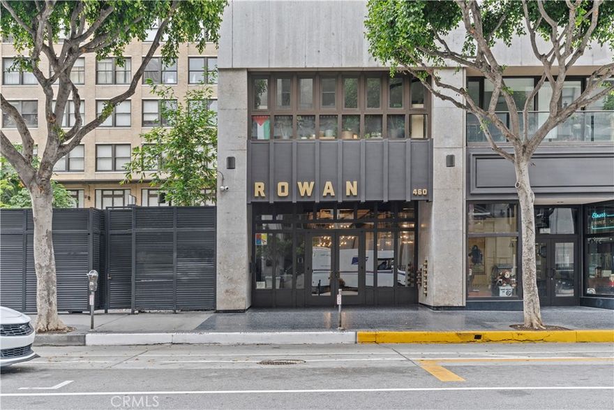 Discover the ideal blend of historic character and modern style in this beautifully updated loft, located in the iconic Rowan building in Downtown Los Angeles. With an open-concept layout, high ceilings, and sound-insulated windows, the space feels bright, airy, and peaceful, offering a comfortable setting for both living and working. Exposed brick walls and timeless architectural touches add warmth and personality, while updated finishes throughout elevate the overall design. The kitchen features premium appliances, custom cabinetry, and a generous island, perfect for daily use or entertaining. The flexible two-bedroom layout includes two full bathrooms, allowing for a home office, studio, or guest space to suit your needs. Enjoy all the benefits of living in a Mills Act-approved building, including significant savings on property taxes. Community amenities include a private garden, spa tubs, BBQ area, and resident lounge. Located steps from Spring Street Park and across from the future UCLA Trust Building, you’re surrounded by Downtown’s best restaurants, shops, cultural venues, and public transit options. This is a rare opportunity to own a thoughtfully designed loft in one of DTLA’s most desirable buildings.