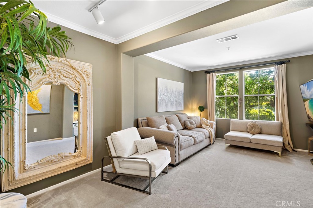 Welcome to one of the most beautifully upgraded residences in the highly sought-after Watermarke Community. This stunning Dorchester model is the largest one-bedroom floor plan, featuring a versatile den with French doors that open to a spacious private balcony and the rare convenience of two dedicated parking spaces. The unit is thoughtfully upgraded with top-of-the-line stainless steel appliances, rich wood flooring in the entry and kitchen, high-end designer carpet, custom window coverings, LED lighting, custom paint, and new washer and dryer. Located just minutes from world-class shopping, the finest beaches in Orange County, John Wayne Airport, UCI, and major freeways, Watermarke offers an unmatched resort-style lifestyle with amenities including concierge service, a state-of-the-art clubhouse with a movie theater, library, business center, and game rooms, a 24-hour fitness center, three pools (including a year-round heated Junior Olympic pool), four cabanas, a covered basketball court, three tennis courts, and a children’s playground. Experience resort-style living at its finest!