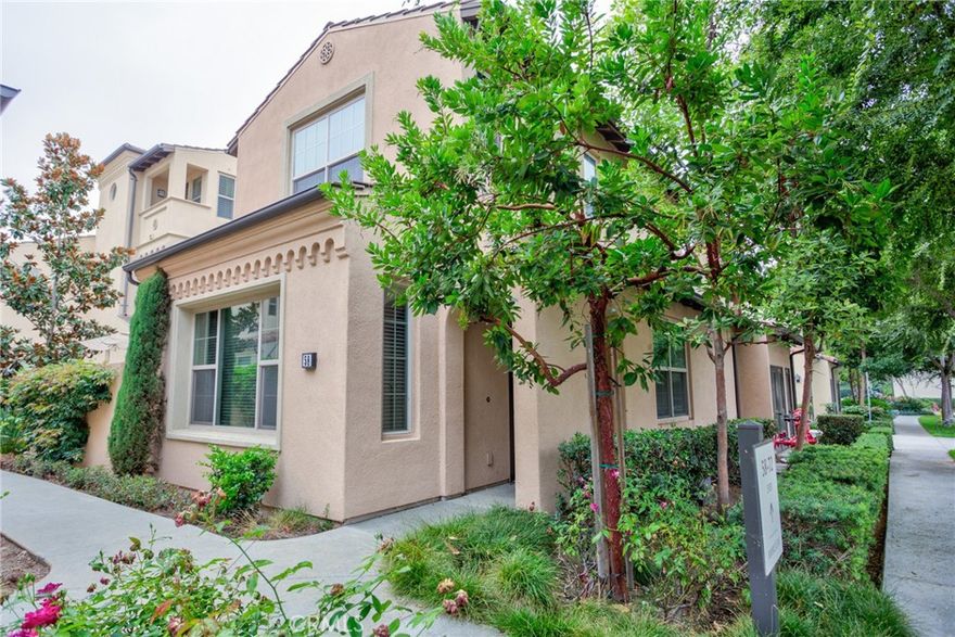 Built in 2015 by **California Pacific Homes**, this **turnkey Zinnia Plan X end-unit townhome** is located in the highly sought-after **Cypress Village community of Irvine**. Designed for both comfort and versatility, the home features **4 bedrooms and 3 bathrooms**, including a **main-floor bedroom and a handicap-accessible bathroom**. Flooded with natural light, the open-concept first floor boasts **hardwood flooring**, **recessed lighting**, and a spacious **family room** that flows seamlessly into the upgraded kitchen and dining area. The kitchen is beautifully appointed with **shaker-style cabinetry**, **sleek quartz countertops**, **tiled backsplash**, a **large island with bar seating**, and **stainless steel appliances**. Upstairs, you’ll find three generous bedrooms, including a **primary suite** with a **walk-in closet**, **dual vanities**, and a **large walk-in shower**. The upstairs **laundry area** includes a **stackable washer and dryer** for convenience. Enjoy outdoor living in the **private side yard**—perfect for relaxing or hosting a BBQ. Additional features include a **two-car attached garage** and plenty of guest parking. Residents have access to **resort-style amenities** such as pools, parks, tennis courts, and scenic walking trails, with easy access to major freeways (5/405/133), shopping destinations like **99 Ranch Market, Woodbury Shopping Center, The District, and Irvine Spectrum**, as well as the **Irvine Train Station** and **John Wayne Airport**. Located within **Irvine’s award-winning school district**, this home offers modern comfort, prime location, and low Mello Roos—making it a truly exceptional place to call home.