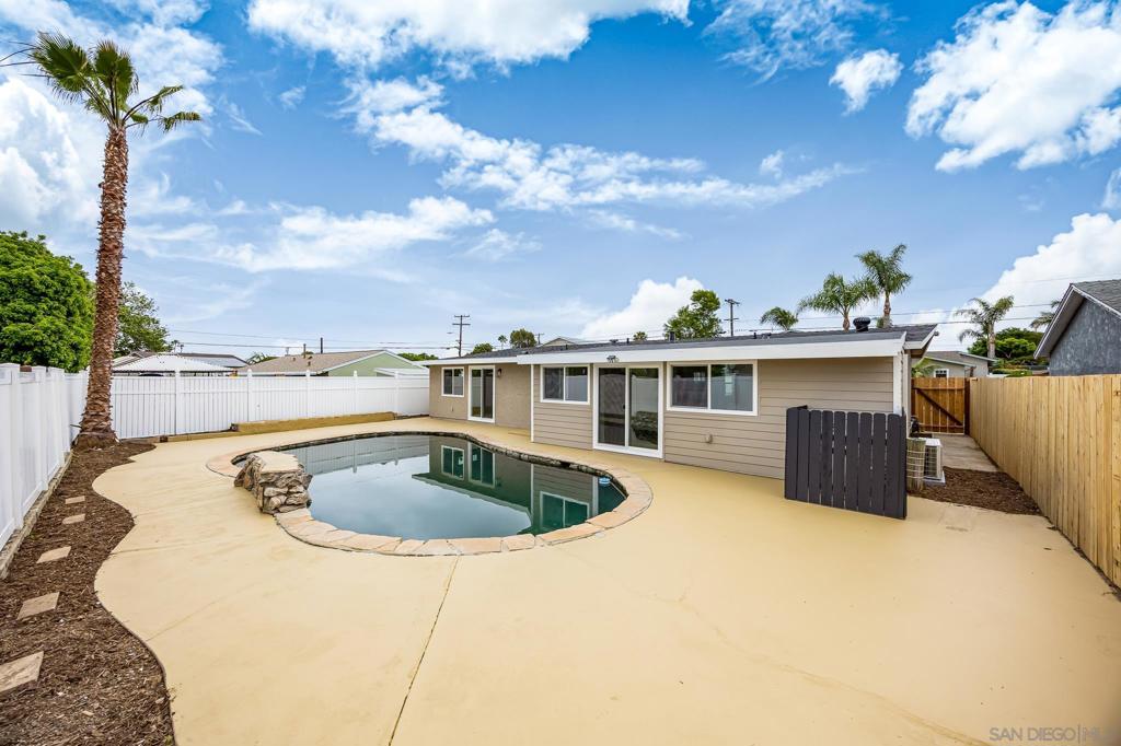 This elegant single level home has been completely remodeled from the roof down, creating a private oasis just minutes from the beach. When you enter the home, you are greeted with a bright and open floor plan seamlessly connecting the kitchen to the living room, and family room, all with a clear view to the sparkling swimming pool in the back yard. The entire remodel was done with high end finishes, new luxury vinyl flooring, new roof, new windows, and 2 new mini splits for efficient heating and A/C. The primary bedroom features an ensuite bathroom, 2 closets for plenty of storage, and direct access to the back yard. Have the piece of mind knowing this home will be worry free for several years, just in time to enjoy the sunshine and family entertaining poolside this summer! Located in a highly desirable neighborhood of North Clairemont with easy freeway access, and close to shopping center.