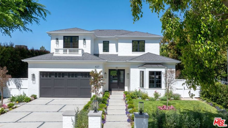 Stunning 2025 brand new construction home in Brentwood. A true masterpiece, this home is ideally located on a quiet, level and subdued stretch of Bundy Drive a mere 3 1/2 blocks north of Sunset with easy ingress and egress to the 405, Westwood, Century City, Santa Monica, LAX, DTLA and the Valley. Just an incredible location! Abundant natural light, high ceilings and wide hallways grace this inviting and welcoming floor plan. Don't miss the high impact circular staircase with spectacular central ceiling skylight and floor to ceiling paneling! There are 7 Bedrooms, 10 Baths, family room, wood paneled office, formal dining room, breakfast nook, both walk-in and butler's pantry. The main floor features en suite bedroom, mud room, designer kitchen with 6-burner Wolf range and Subzero side-by-side refrigerator and freezer. The bright kitchen flows into the family room which features multi-paneled sliding glass doors opening to the patio and expansive grassy yard, pool and spa. Luxurious upper level primary suite with fireplace, outdoor balcony, coffee bar and spa-like bath with dual walk-in closets and separate commode rooms. There are three additional upstairs en suite bedrooms and a secondary laundry room. Finished basement with home theater, gym, sauna, game room with full bar, sink and appliances, en suite bedroom and main laundry room. There is an elevator to all floors. The home has a separate 750 sq ft ADU with its own address, complete with kitchen, bath, bedroom, multi panel pocket door and outdoor shower. Serenity and tranquility abound in this perfect and majestic new construction home located in the heart of Brentwood.