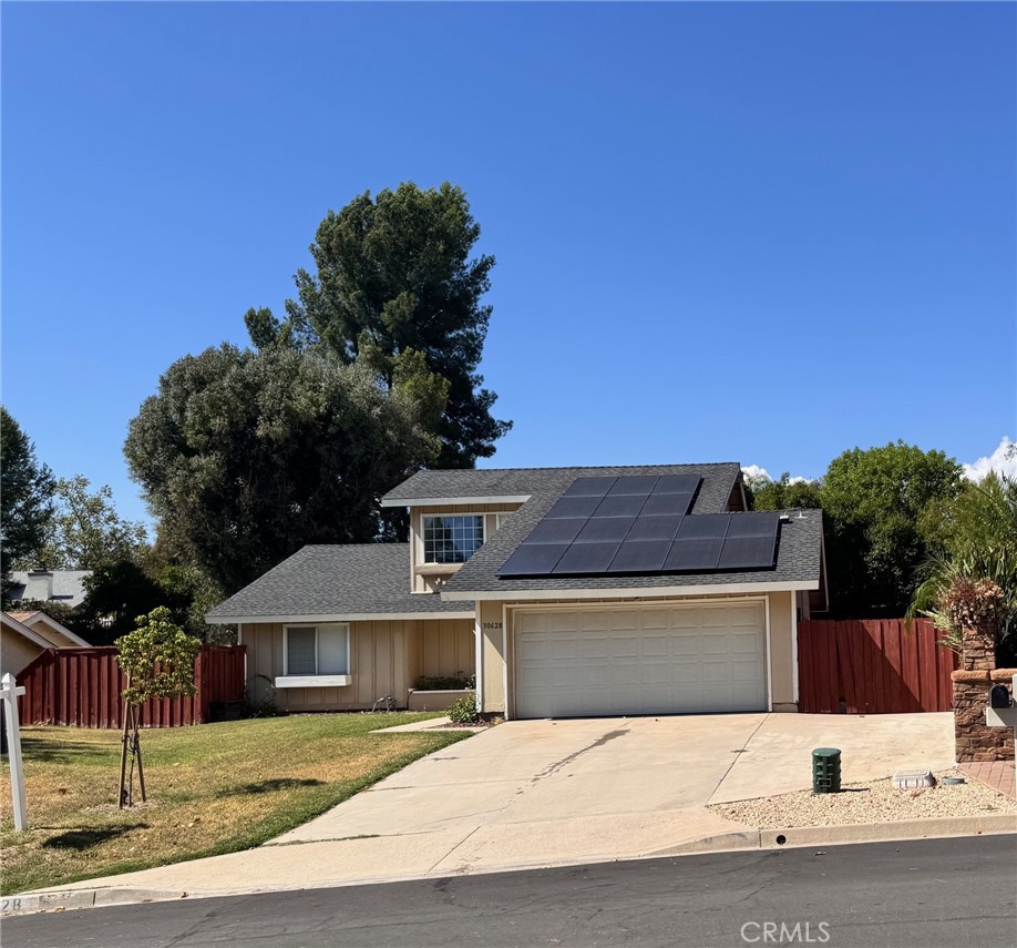 This property is an opportunity!! The price reflects the buyer assuming the solar lease ($29,000.) Newly remodeled bathrooms & wood like tile flooring. Updated stone fireplace. Newer carpet. Two bedrooms downstairs & one large bedroom currently used as a den and a full bathroom upstairs. Ceiling fans through out including one in the outdoor patio. This home has an open concept with the living room and dining area opened to the kitchen. Direct access to an oversized garage. Extra parking on side of house. As if that isn't enough... this home has an oversized lot of 11.761sq ft. Close to the 15 freeway near Temecula community recreation center. Temecula Valley high school is rated 9 out of 10! This a short sale. Please read agent comments.