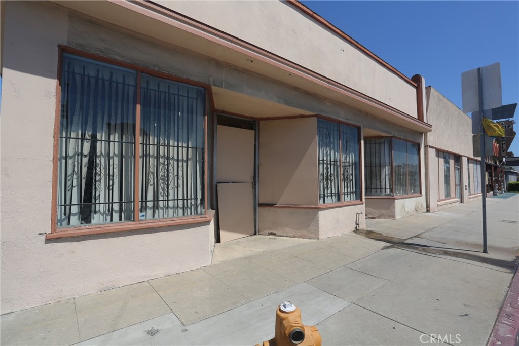-This Corner property Consists of Two L.A. County Parcels: 5588 Atlantic Ave. APN 71237-009-034 and 5596 Atlantic Ave. APN 7127-009-001. Access to the rear of the subject is an easement 12.5' X 90' alley type piece of land. Enter at the gate at 56th st. thru gate at NE corner of property over APN 7127-009-033. Various of subject property could be retail and offices and possible set production company which a portion of it was used for most recently. Parking: APPROX. 8775 SQ FT. SITE. It was legally identified as anon-conforming property because there was not enough parking SQ FT. Building age on the property profile indicated 1926 and 1940. Gross building area was indicated at 7,088 SQ FT. Construction is wood and stucco with concrete flooring. Has a Comp roof and window with security grated installed. Interior is drywall and plaster. Office areas have skylights and florescent lighting. Ceiling height is apron 10 Ft. Has 3 Bathrooms and central Heating. Shop has Storage Area one ceiling suspended area heating units.
5588 has 3740 Bldg Sq Ft. and 4566 Lot Sq Ft.
5596 has 3275 Bldg Sq Ft. and 4356 lot Sq Ft.