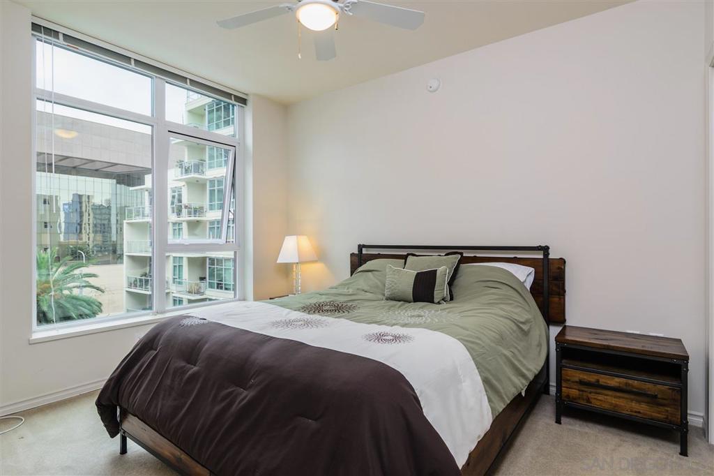 Fully Furnished turn key home w/ granite slab, new dark wood flooring, stainless steel appliances and in-unit W/D. Just bring your toothbrush! The Breeza complex is just 1 block from the San Diego Bay, Star of India, Waterfront Park & N. Embarcadero. Enjoy the "Million Dollar" unobstructed sunset & ocean views from the rooftop terrace, entertain in the common area rec room, heated pool, Jacuzzi & BBQ patio, w/o in the fitness center, or just relax to the sound of the soothing courtyard waterfall.