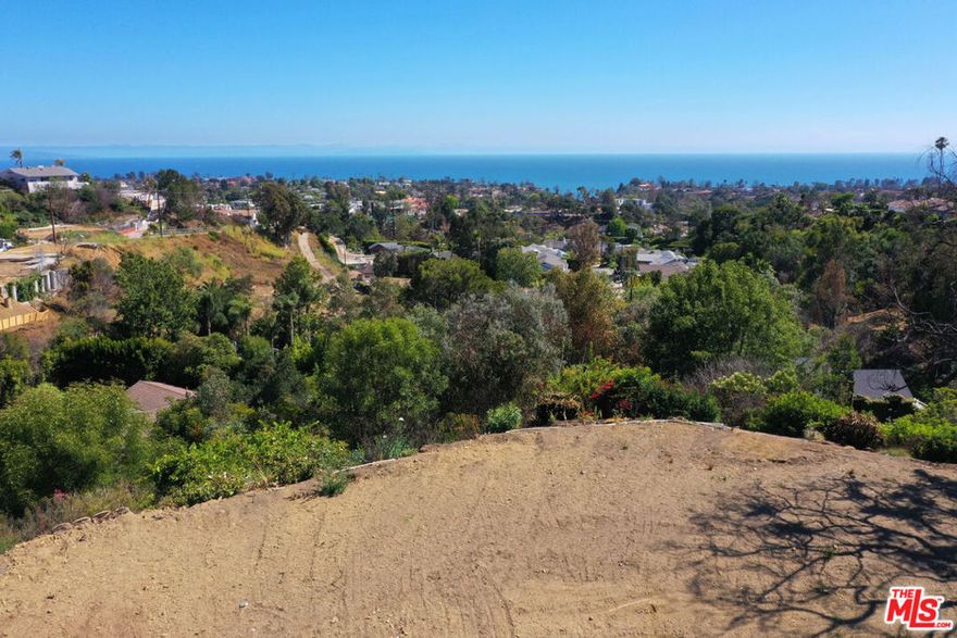 Exclusive 'Protected' Sweeping Ocean View Land offering in Pacific Palisades. Perched at the top of a quiet, exclusive street, 1243 Las Lomas Avenue offers a rare opportunity to create a true legacy estate in one of the most coveted enclaves of Pacific Palisades. Priced at just $129.00 per square Foot! This enormous 29,380 square foot parcel is one of the largest buildable ocean-view land parcels in the area, with an unmatched canvas for a custom architectural masterpiece. Framing unobstructed views of Catalina Island and the Palos Verdes coastline, the property's elevated topography captures the full arc of west-facing sunsets and fills future interiors with natural light. With no neighbors in front or behind, the setting is both visually expansive and deeply private. Imagine a gated compound with an infinity-edge pool, terraced gardens, seamless indoor-outdoor flows, sunset terraces, panoramic decks, and long-view sightlines from nearly every room. Whether you envision modern minimalism or old-world grandeur, this land is build-ready and ideally oriented for light, privacy, and drama. Land of this scale with this level of views and privacy rarely become available in the Palisades. This is more than land; it's a singular opportunity to craft an estate that reflects the full potential of coastal California living. Professional property-walks are strongly recommended, as Land boundaries go well beyond what's visible in the cleared pad area. We work closely with a trusted design-build team offering full design, permitting, and construction expertise to bring your vision to life. If you're narrowing your choices and seeking a truly enduring ocean vantage, this rare parcel is unmistakably the one. With verifiably protected views and horizon preserved, it remains as captivating today as it will be tomorrow.