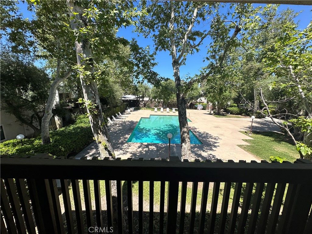 Photo of 23515 Lyons Ave #219, Valencia, CA 91355 (MLS # SR26082475)