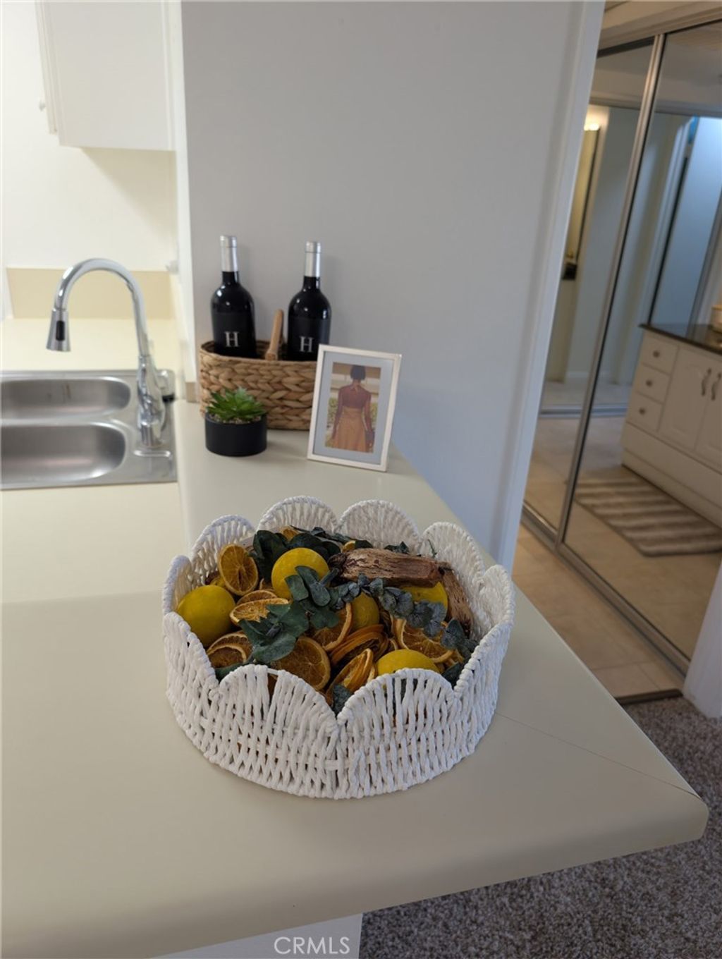 Photo of 23515 Lyons Ave #219, Valencia, CA 91355 (MLS # SR26082475)