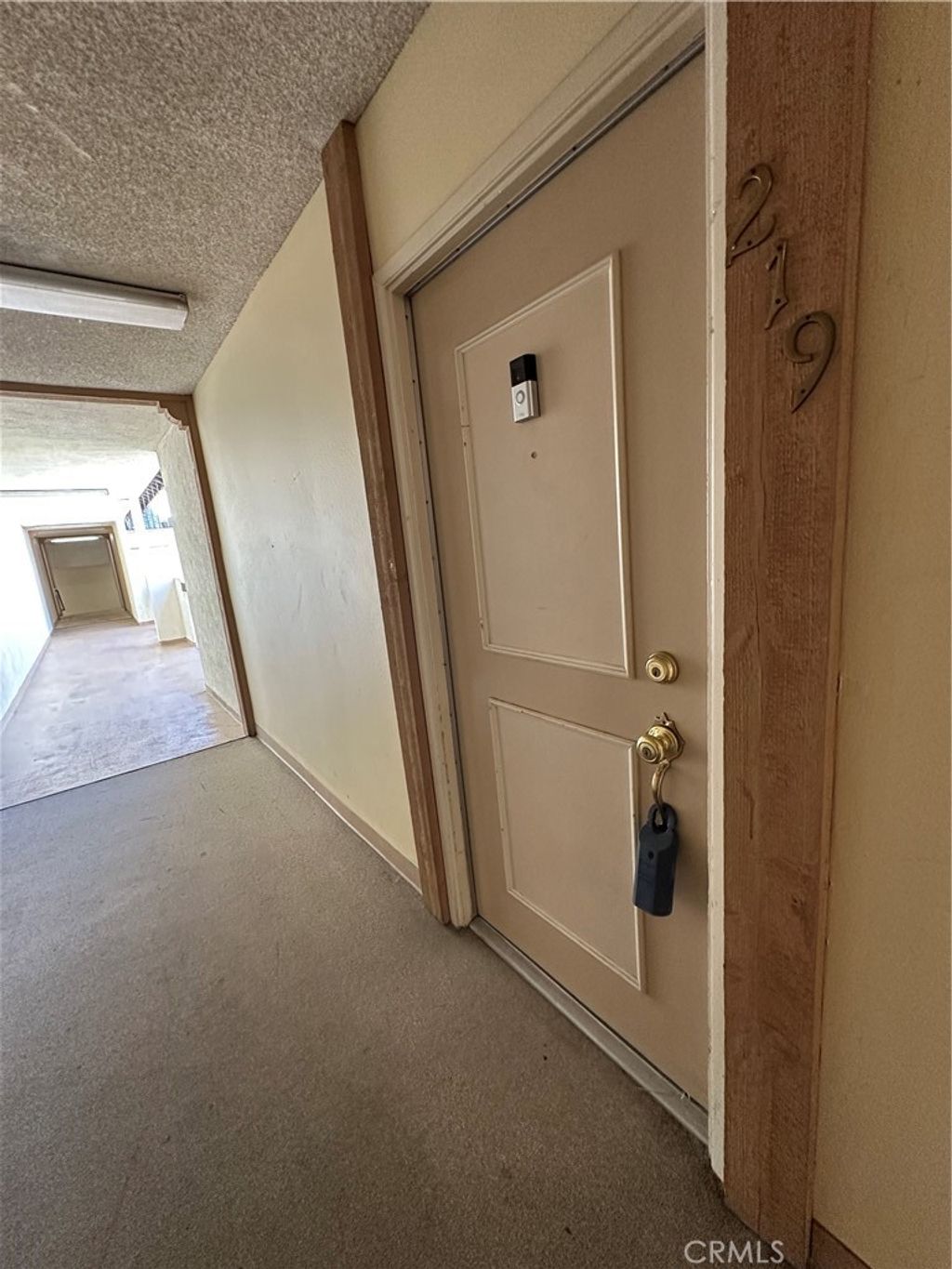 Photo of 23515 Lyons Ave #219, Valencia, CA 91355 (MLS # SR26082475)