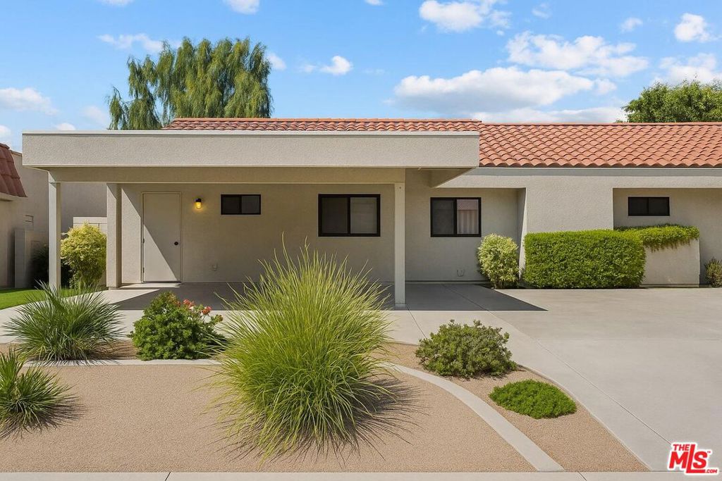 Set within the gates of Palm Desert Resort Country Club, this 2-bedroom, 1.5-bath condo offers sweeping golf course and mountain views along with access to one of the Coachella Valley's most amenity-rich communities. Inside, the home features vaulted ceilings, tile flooring throughout, and an open-concept layout with a kitchen that flows into the living area and out to a private patio overlooking the 11th fairway ideal for relaxing or entertaining. The primary bedroom shares the same scenic backdrop, and two side-by-side parking spaces, including a covered carport, add everyday convenience. Residents of this guard-gated community enjoy a truly resort-style lifestyle. Amenities include a Joe Mulleneaux designed 18-hole championship golf course, 20 heated pools and spas, 28 pickleball courts, and 7 tennis courts. The newly renovated 42,000-square-foot clubhouse features a full-service restaurant, bar, and fitness center, and serves as the hub for social gatherings and community events. Professionally maintained landscaping and wide greenbelts add to the neighborhood's charm and livability. With world-famous events like the Coachella and Stagecoach music festivals drawing visitors year after year, this home is also a standout opportunity for short-term rental income or an Airbnb investment. Short-term rentals are allowed, making it equally attractive as a full-time residence, seasonal getaway, or smart income-producing property. With its unbeatable blend of comfort, location, and amenities, this is desert living at its best.