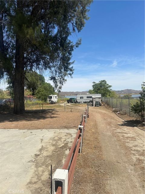 Photo of 18060 Grand Avenue, Lake Elsinore, CA 92530 (MLS # SW26084129)
