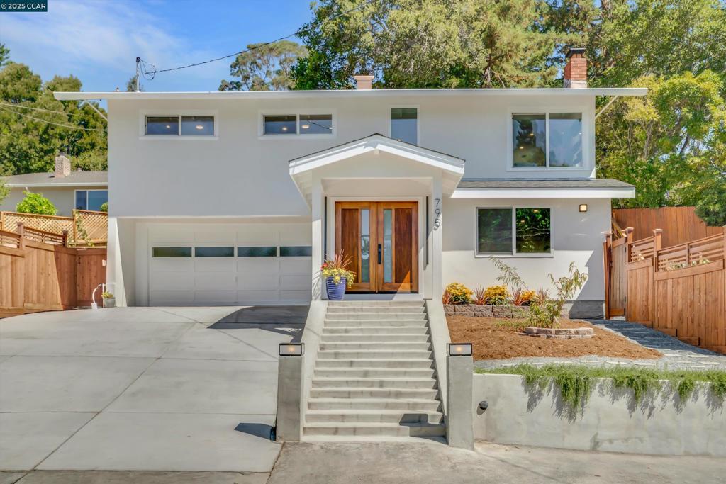 Welcome to your dream home in Lower Emerald Hills! This COMPLETELY renovated 4BR/3BA residence offers a perfect blend of comfort, luxury & versatile living, nestled on a beautifully landscaped 8,500 sqft lot. Step inside to discover a gorgeous oak staircase welcoming you into the heart of the home: a gourmet, open concept kitchen designed for culinary delight, boasting stunning quartz counters, custom white oak cabinets & professional-grade S/S appliances, all w/access to an expansive redwood deck & outdoor living space designed for seamless indoor-outdoor living. Private patio areas create a serene oasis perfect for relaxation & entertaining. Gather around the fire pit, enjoy the incredible variety of fruit trees, a flourishing vegetable garden & a picturesque vineyard, all set against tranquil, private surroundings. A unique highlight of this home is the spacious, private downstairs suite, complete w/full bath, a generous LR & patio access. This versatile space offers possibilities as an attached ADU, guest quarters, or a comfortable option for multi-generational living–perfect for caring for aging parents or providing independent space for family members. This 1,732 sqft beauty is a remarkable offering! Don't miss this opportunity! Open House: Sunday, August 10th - 12-3pm
