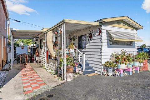 Photo of 16511 Garfield Ave #43B, Paramount, CA 90723 (MLS # DW26037464)