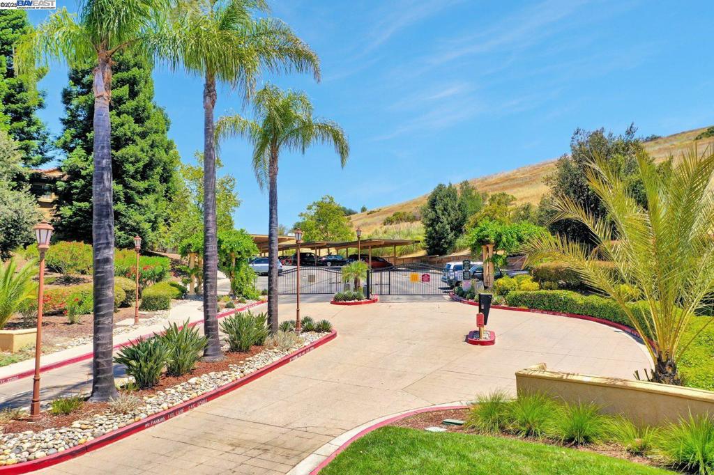 Discover serene living in this top-floor unit, offering stunning mountain views from your private balcony. The open living space is beautifully illuminated by double sliding doors, allowing an abundance of natural light. Enjoy the convenience of an in-unit laundry room equipped with a washer and dryer, along with generous storage space. The spacious bedroom features high ceilings, wide mirrored closets and the added privacy of no shared walls with the neighbors. Additional highlights include modern fixtures, elegant crown molding, and a NEW installed HVAC system. Located at the community's edge, this unit provides peaceful surroundings, breathtaking views, and ample guest parking. Benefit from community amenities such as a pool, spa, gym, and security gate, all nestled within a lively neighborhood near shopping and dining venues. HOA also covers roof, water and trash. Don't miss out on this opportunity, it is perfect for homeownership or investment.