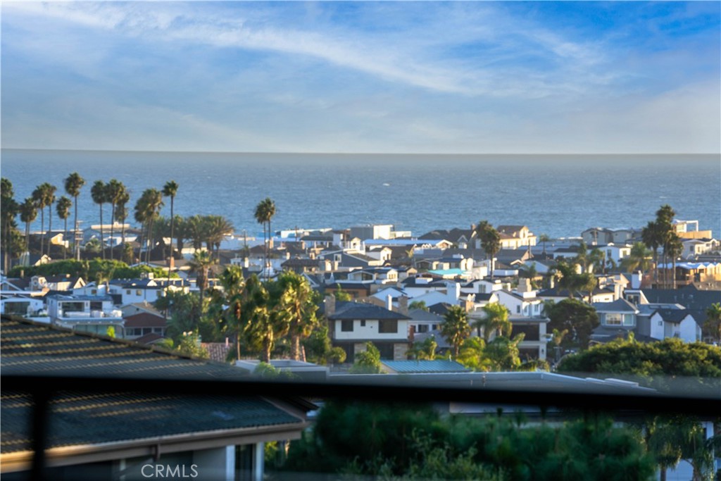 Welcome to the gated community of Villa Balboa. This upscale two-bedroom, two-bathroom furnished penthouse condo offers 1,600 sf of abundant sunlight throughout, vaulted ceilings, and a spacious balcony with beautiful ocean views.
Remodeled with high-end Viking kitchen appliances, custom cabinetry, and luxury finishes. This condo’s numerous large windows and skylights make the use of artificial light unnecessary. Relax in the warmth of the living room fireplace. Take in the sights from the large, covered, wrap-around patio space with views of stunning sunsets over Catalina Island and the Pacific Ocean. Enjoy the association’s pools, spas, tennis courts, and gym. The assigned garage parking spaces, in-unit laundry, and elevator access are all included.
While Orange County is known to be the center of California surf culture, this area also boasts top-rated restaurants, boating, water sports, and world-class beaches, all within walking distance.