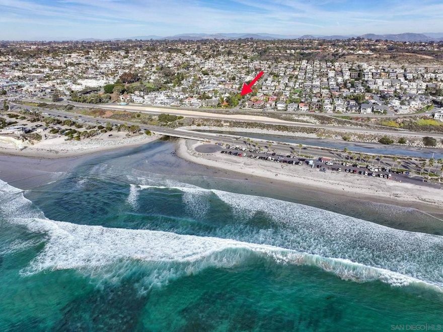 Whether you're seeking a serene beach escape, an income-producing investment, or a future development, this Cardiff gem represents a chance to own a piece of Cardiff in one of the most desirable pockets. Sitting on an R-2  corner lot with OCEAN VIEWS from the yard, this remodeled cottage offers the opportunity to enjoy now and build later, with the potential to create a twinhome or SFR, JDU & ADU...many options, or expand your coastal retreat, a rare offering in this beachside neighborhood. With an effortless stroll to the ocean, this charming 2bd/1b  800sf home offers instant vacation vibes.  In addition to the main home, there is a separate 300-sf studio with a full bath, ideal for a home office. Enjoy all Cardiff has to offer, including Seaside Market, The Shanty, Waverly, and so many fun places to explore.  WELCOME HOME!  Whether you're seeking a serene beach escape, an income-producing investment, or a future development, this Cardiff gem represents a chance to own a piece of Cardiff in one of the most desirable pockets. Sitting on an R-2  corner lot with OCEAN VIEWS from the yard, this remodeled cottage offers the opportunity to enjoy now and build later, with the potential to create a twinhome or SFR, JDU & ADU...many options, or expand your coastal retreat, a rare offering in this beachside neighborhood. With an effortless stroll to the ocean, this charming 2bd/1b  800sf home offers instant vacation vibes.  In addition to the main home, there is a separate 300-sf studio with a full bath, ideal for a home office. Enjoy all Cardiff has to offer, including Seaside Market, The Shanty, Waverly, and so many fun places to explore.  WELCOME HOME!