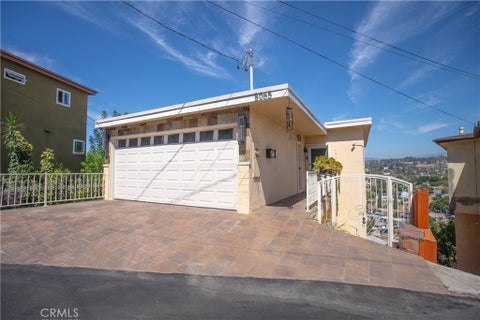 Photo of 5065 La Calandria Drive, Los Angeles, CA 90032 (MLS # RS26184585)