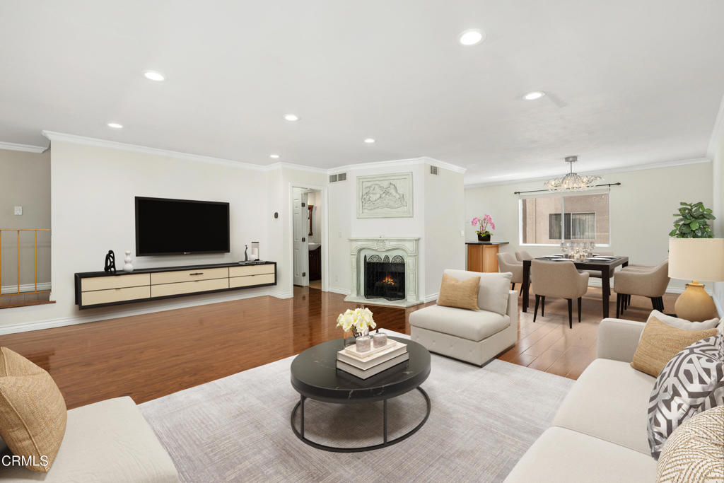 Welcome to this spacious and beautifully updated 4 bedroom, 2 bathroom townhome, ideally located in one of the most accessible areas of the Cabrini Villas community. This move-in-ready home features fresh interior paint, a formal dining room, a remodeled kitchen with brand new cabinets, a beautiful fireplace, and a new water heater for added efficiency and peace of mind. Enjoy a private patio, perfect for relaxing or entertaining, along with a 2-car attached garage with direct access. Cabrini Villas offers resort-style living with amenities including multiple pools and jacuzzis, tennis courts, a sports court, playground, dog park, clubhouse, and 24-hour patrolled security. With central heating and air, plenty of guest parking, and close proximity to freeways, dining, shopping, and entertainment - this home truly has it all.