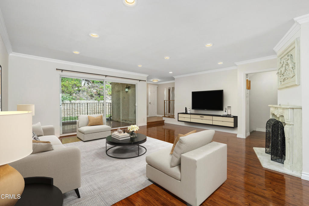 Welcome to this spacious and beautifully updated 4 bedroom, 2 bathroom townhome, ideally located in one of the most accessible areas of the Cabrini Villas community. This move-in-ready home features fresh interior paint, a formal dining room, a remodeled kitchen with brand new cabinets, a beautiful fireplace, and a new water heater for added efficiency and peace of mind. Enjoy a private patio, perfect for relaxing or entertaining, along with a 2-car attached garage with direct access. Cabrini Villas offers resort-style living with amenities including multiple pools and jacuzzis, tennis courts, a sports court, playground, dog park, clubhouse, and 24-hour patrolled security. With central heating and air, plenty of guest parking, and close proximity to freeways, dining, shopping, and entertainment - this home truly has it all.