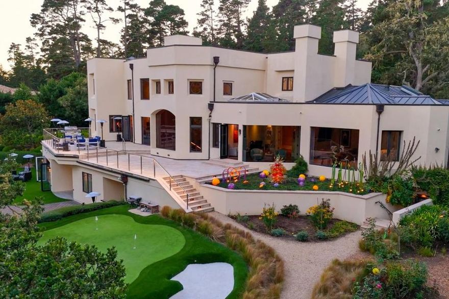 A captivating private retreat and golf destination set in the heart of the world-famous golf mecca of Pebble Beach. Minutes from both downtown Pebble Beach and Carmel-by-the-Sea, enjoy world class dining, shopping, spas, beaches and the Lodge, and minutes from the most elevated golf experiences the world has to offer. This luxurious estate is one of only 20 properties located in the exclusive gated community of Macomber Estates. For the avid golfer, executive, and entertainer alike this 10-acre compound, boasting over 12,000 square feet of living space, offers exceptional quality in this prestigious location. Seven bedrooms, eight bathrooms, a state-of-the-art golf simulator room, a new putting green, extensive gym, guest house, two garages accommodating six cars, and expansive indoor-outdoor entertaining spaces. This home is magnificent in both size and space, promising the ultimate luxury lifestyle experience for owners, family, friends and their guests.