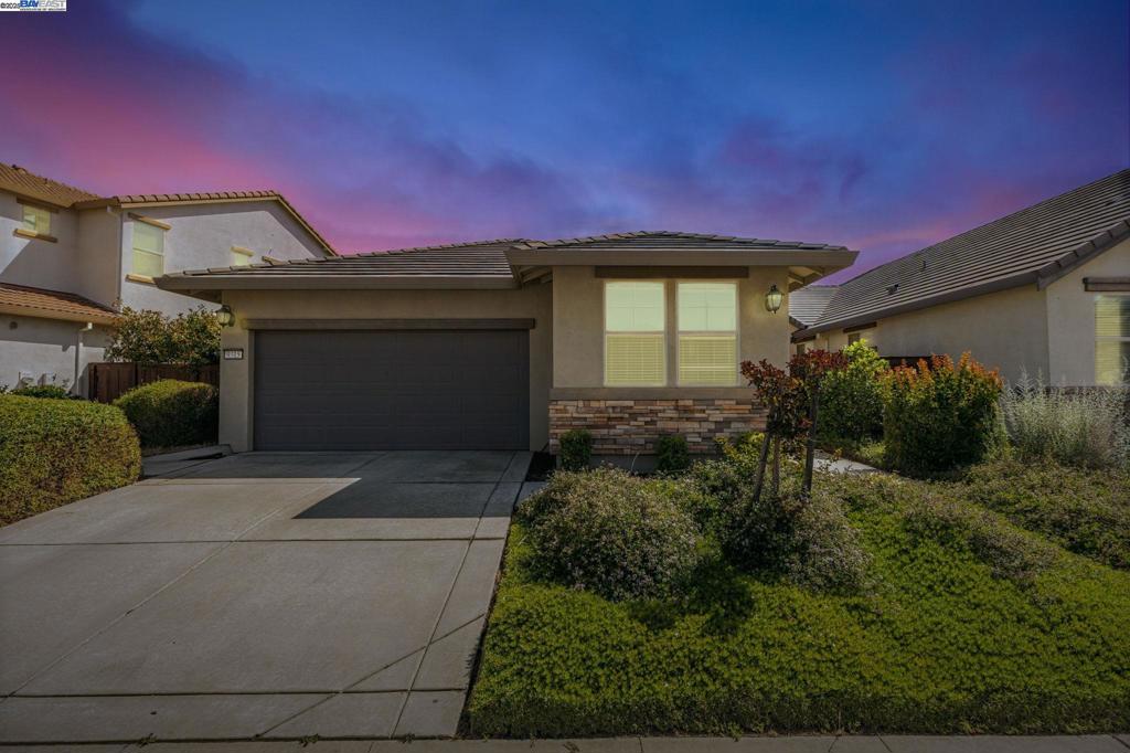 Step into this beautifully maintained 4-bedroom, 2-bath home that blends comfort, style, and functionality. The open-concept layout offers a spacious and inviting atmosphere, ideal for both everyday living and entertaining. The kitchen is a chef’s dream, featuring elegant granite countertops and sleek stainless steel appliances that make cooking a pleasure. The primary suite also boasts granite finishes, creating a cohesive and luxurious feel throughout the home. Enjoy gatherings or quiet evenings in the stunning backyard, thoughtfully designed for relaxation and entertaining alike. Located within the highly sought-after Elk Grove Unified School District, this home is perfect for families looking for quality education options. You'll also appreciate the convenience of being close to multiple shopping centers, offering a variety of dining, retail, and everyday essentials just minutes away. This home truly has it all — comfort, convenience, and charm.